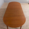 Extendable round teak dining table Model by H