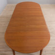 Extendable round teak dining table Model by H