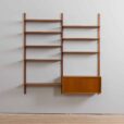 Danish teak wall unit with sliding door cabinet and  shelves in the style of Kurt Ostervig s