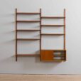 Danish teak wall unit with sliding door cabinet and  shelves in the style of Kurt Ostervig s