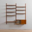 Danish teak wall unit with sliding door cabinet and  shelves in the style of Kurt Ostervig s