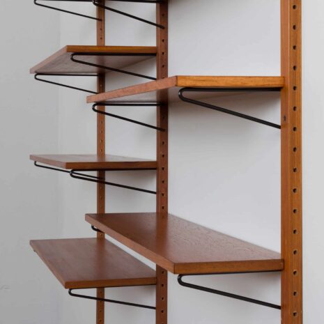 21395 Danish teak wall unit with sliding door cabinet and 8 shelves in the style of Kurt Ostervig, 1960s-31 Danish teak wall unit with sliding door cabinet and shelves in the style of Kurt Ostervig s