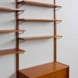 Danish teak wall unit with sliding door cabinet and  shelves in the style of Kurt Ostervig s