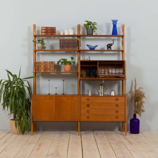 Scandinavian  bay teak wall unit with a bar cabinet and brass details kleppen ingolf boben