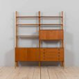 Scandinavian bay teak wall unit with a bar cabinet and brass details kleppen ingolf boben
