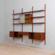 Teak wall unit with cabinets and modular shelving system by Sorensen Cadovius Denmark s