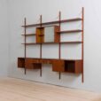 Teak wall unit with cabinets and modular shelving system by Sorensen Cadovius Denmark s