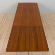 Rectangular teak dining table with hidden extension leaves by Johannes Andersen