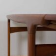 Rectangular teak dining table with hidden extension leaves by Johannes Andersen