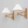 Pair of adjustable oak scissor lamps by Erik Hansen Danish Le Klint wall sconces