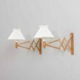 Pair of adjustable oak scissor lamps by Erik Hansen Danish Le Klint wall sconces