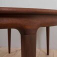 Mid century lacquered rosewood round dining table with  extension leaves with aprons Denmark s