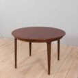 Mid century lacquered rosewood round dining table with  extension leaves with aprons Denmark s
