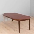 Mid century lacquered rosewood round dining table with  extension leaves with aprons Denmark s