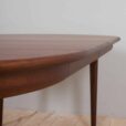 Mid century lacquered rosewood round dining table with  extension leaves with aprons Denmark s