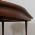 Mid century lacquered rosewood round dining table with  extension leaves with aprons Denmark s