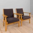 Pair of oak GE Hans Wegner easy lounge chairs in original upholstery Denmark s
