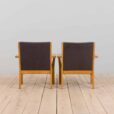 Pair of oak GE Hans Wegner easy lounge chairs in original upholstery Denmark s