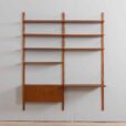 zmodyfikowano  Two bay Modular teak shelving system with a desk Cadovius wall unit
