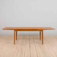Rectangular dining table in teak with hidden extensions by Henning Kjaernulf Denmark s