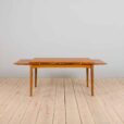 Rectangular dining table in teak with hidden extensions by Henning Kjaernulf Denmark s