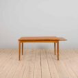 Rectangular dining table in teak with hidden extensions by Henning Kjaernulf Denmark s