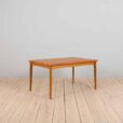 Rectangular dining table in teak with hidden extensions by Henning Kjaernulf Denmark s