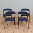 Set of reupholstered mid century Danish teak dining chairs by Th