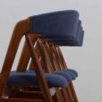 Set of reupholstered mid century Danish teak dining chairs by Th