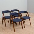 Set of reupholstered mid century Danish teak dining chairs by Th