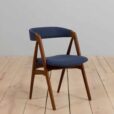 Set of reupholstered mid century Danish teak dining chairs by Th