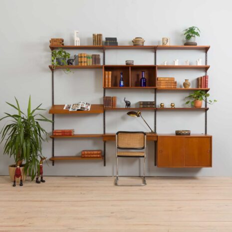 Three bay teak wall unit with  cabinets and a home offifce desk by Kai Kristiansen