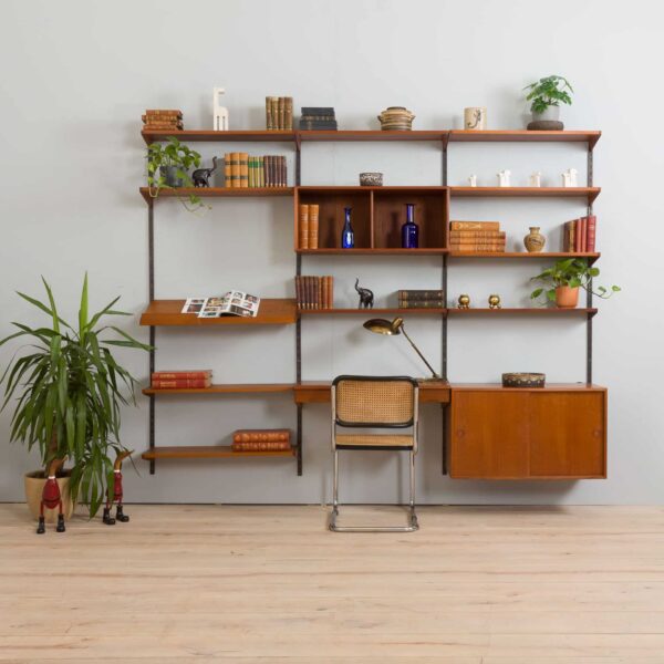 Three bay teak wall unit with  cabinets and a home offifce desk by Kai Kristiansen