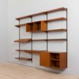 Three bay teak wall unit with  cabinets and a home offifce desk by Kai Kristiansen