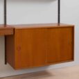 Three bay teak wall unit with  cabinets and a home offifce desk by Kai Kristiansen