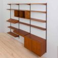 Three bay teak wall unit with  cabinets and a home offifce desk by Kai Kristiansen