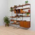 Three bay teak wall unit with  cabinets and a home offifce desk by Kai Kristiansen