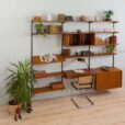 Three bay teak wall unit with  cabinets and a home offifce desk by Kai Kristiansen