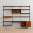 Three bay teak wall unit with  cabinets and a home offifce desk by Kai Kristiansen
