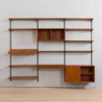 Three bay teak wall unit with  cabinets and a home offifce desk by Kai Kristiansen