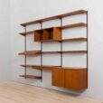 Three bay teak wall unit with  cabinets and a home offifce desk by Kai Kristiansen