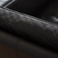 a pair of leather armchairs