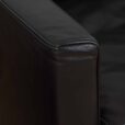 a pair of leather armchairs