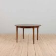 Vintage Danish round extension table in rosewood by Kai Kristiansen with additional leaves s in Vodder style