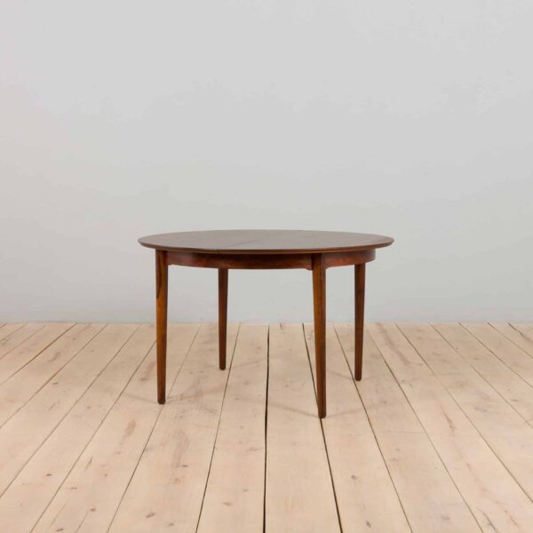 Vintage Danish round extension table in rosewood by Kai Kristiansen with  additional leaves s in Vodder style