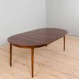 Vintage Danish round extension table in rosewood by Kai Kristiansen with additional leaves s in Vodder style