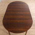 Vintage Danish round extension table in rosewood by Kai Kristiansen with additional leaves s in Vodder style