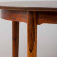 Vintage Danish round extension table in rosewood by Kai Kristiansen with additional leaves s in Vodder style