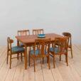 large extension teak dining table