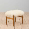 Danish mid century solid oak footstool in long sheepskin wool s